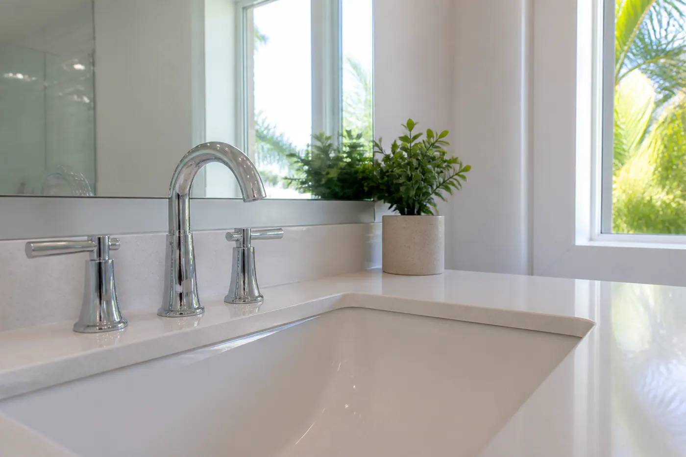 Bathroom sink and faucet with hard water spotting